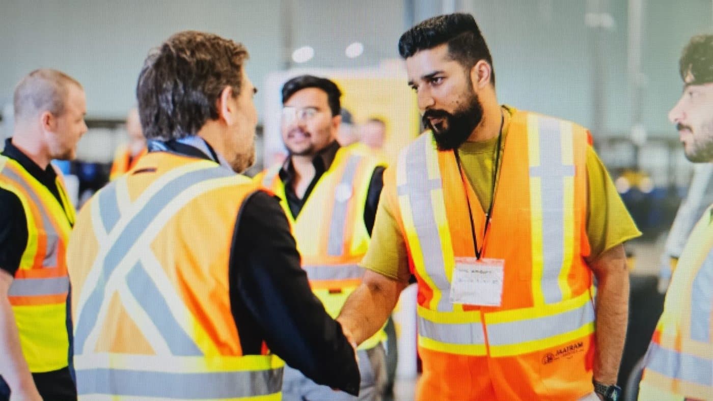 Sahil, Founder of Jaatram Logistics, meeting partners on the floor at a Dragonfly station